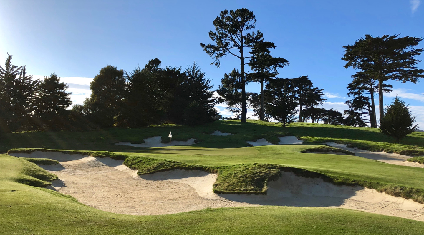 Bunkers guard the entire left side on the 15th
