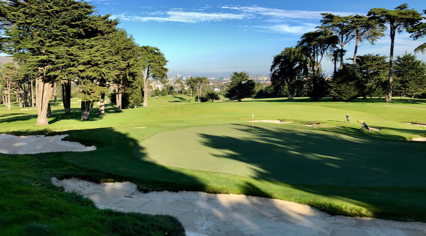 From the hillside above this beautifully set green