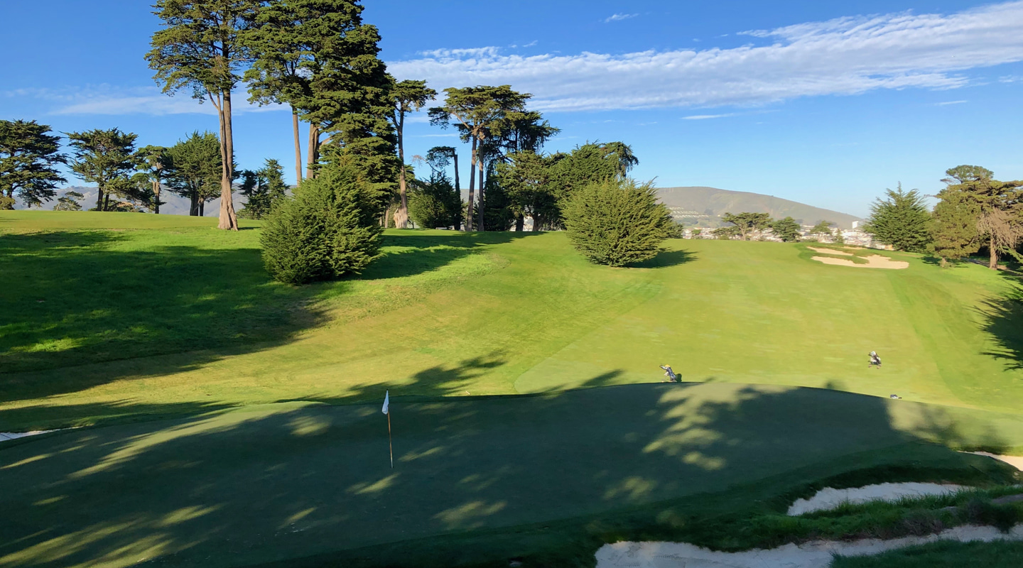 Looking down at the green with the 17th stretching beyond