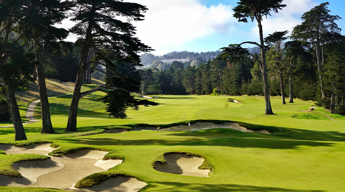 Bunkers guard the approach from the left side of the fairway - Photo Credit: Jon Cavalier
