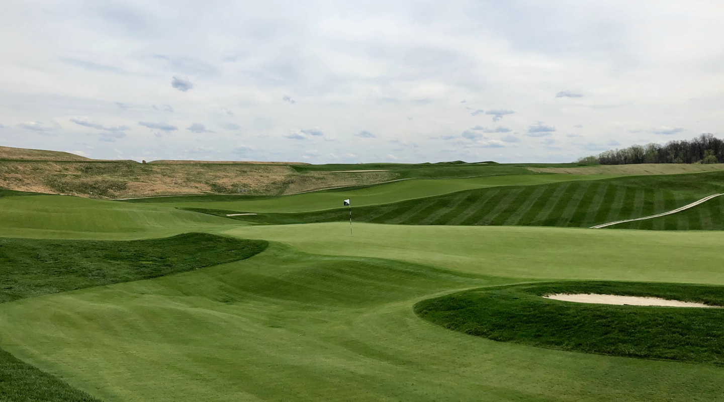 The varied surrounds right of the green on the par-5 18th