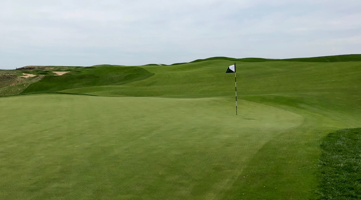 On the contoured green at the par-4 9th