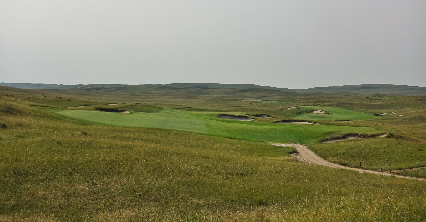 The 10th requires a confident drive to the canted fairway The 10th requires a confident drive to the canted fairway
