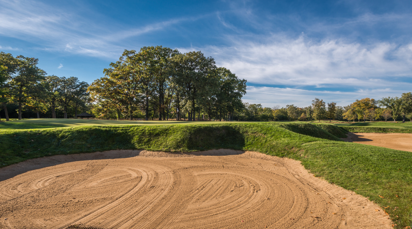 Bunkers surround Langford's final par-3 Bunkers surround Langford's final par-3
