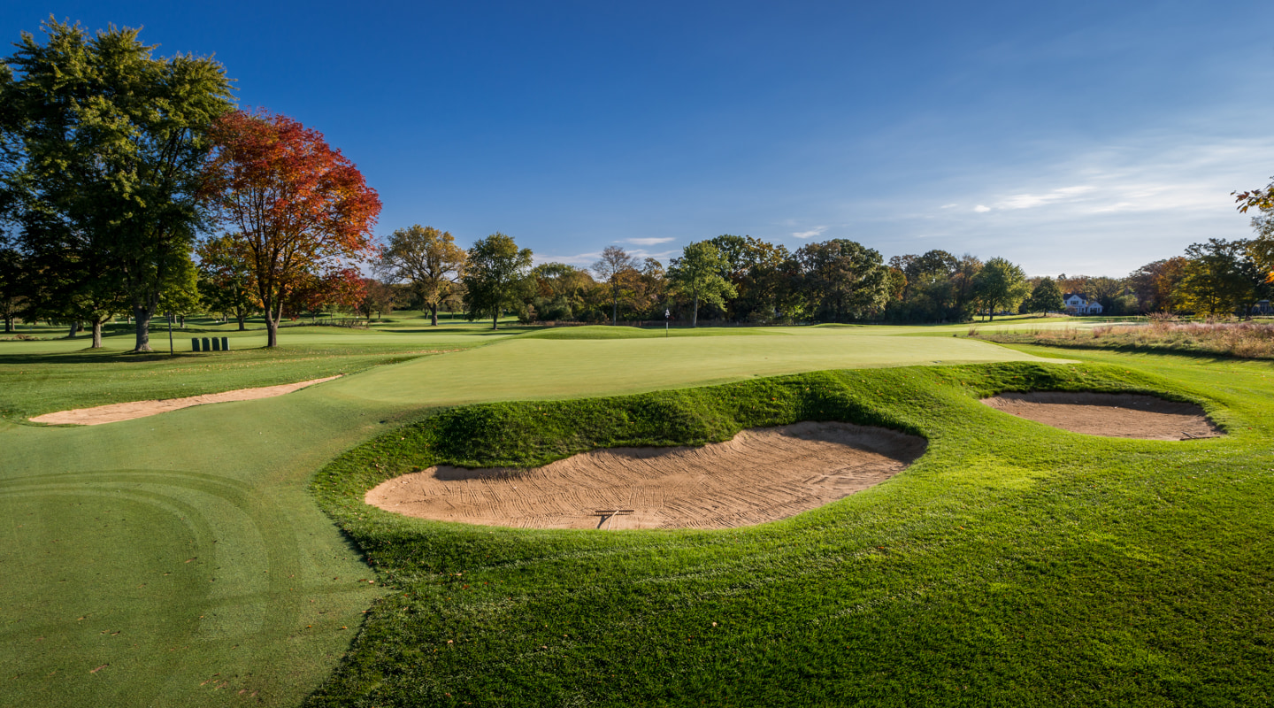 Deep bunkers guard greenside right Deep bunkers guard greenside right