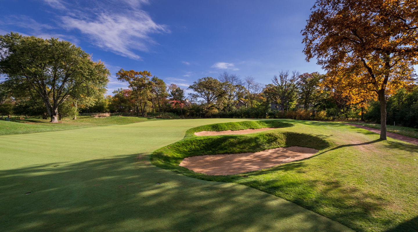 Deep bunkers guard the front right Deep bunkers guard the front right